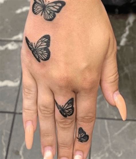 butterfly tattoo on hand|8 Butterfly Hand Tattoo Ideas And Their Meanings